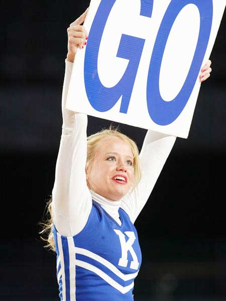 Kentucky's cheerleaders held above head
