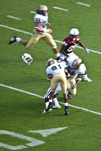 UAB defender knocks Mississippi State football helmet off head